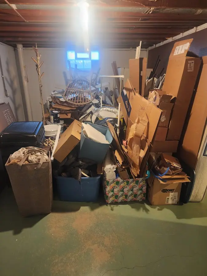 Roll-off dumpster container at job site for Concrete Dumpster Rental in Newtown